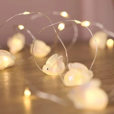 Image of Lights4fun Indoor 20 Warm White Micro LED Battery Operated Easter Bunny Decorative String Fairy Lights with Timer 1.9m