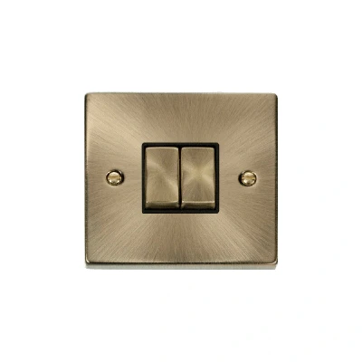Image of Click Deco 2 Gang Way Ingot 10AX Switch Antique Brass Black Inserts
