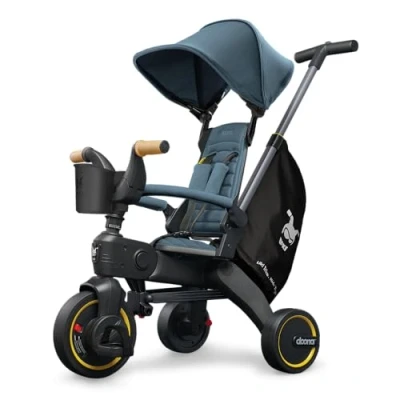 Image of DOONA Liki Baby Trike S5 Deluxe Foldable Toddler Tricycle with parent handle for ages 10 Months to 3 Years Ocean Blue