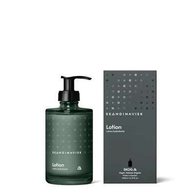 Image of Skandinavisk SKOG ‘Forest’ Hand &amp; body lotion, Scent notes: Pine needles and fir cones, birch sap woodland lily of the valley, Coloured glass bottle with pump, 200 ml