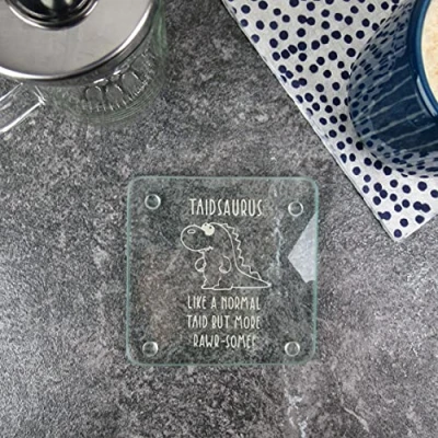 Image of eBuyGB Taidsaurus Square Glass Coaster, Dinosaur Taid Birthday Gift, Present for Welsh Grandad, Engraved Drinks Coaster