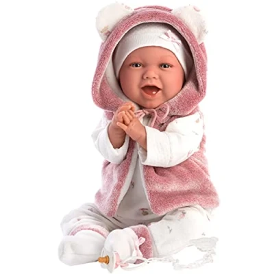 Image of The happy Mimi is a 42 cm tall baby doll with blue eyes and soft body. Head, arms legs are made of vinyl