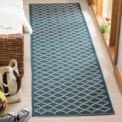 Image of SAFAVIEH Trellis Rug for Indoor &amp; Outdoor Courtyard Collection, Short Pile, in Navy and Beige color, 69 X 244 cm