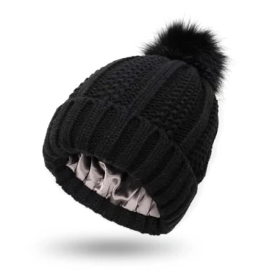 Image of Bcenoilua Winter Warm Knitted Hat Women Stretchy Chunky Cable Knit Thermal Insulating Satin Lined with Faux Fur Pompom Outdoor Beanie Hat/Black