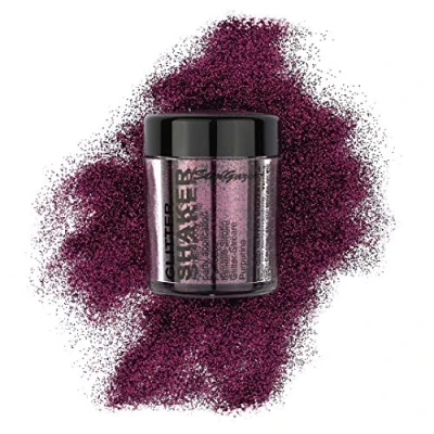 Image of Stargazer glitter Shaker, Garnet. Cosmetic powder for use on the eyes, lips, face, body, hair and nails.