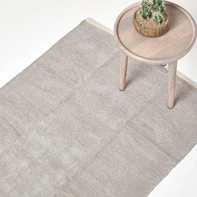 Image of HOMESCAPES Light Grey Rug 100% Cotton Plain Modern Reversible Chenille Floor Mat with Natural Colour Trim Anti Shedding Soft Touch Washable, Extra Large, 110 x 170 cm (43&quot; 67&quot;)