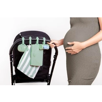 Image of Ubbi On the Go Diapering Gift Set, Includes Changing Mat and Bag, Wipes Dispenser, Pacifier Holder Bag Newborn Essentials, Sage