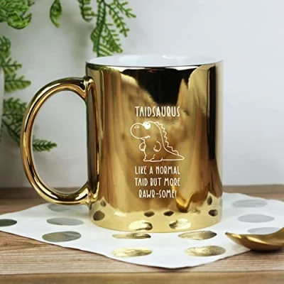 Image of eBuyGB Taidsaurus Mug, Taid Dinosaur Engraved Shiny Gold Metallic Reveal Coffee Father&#039;s Day Gift for Welsh Grandad, Grandpa, Birthday Gift, Funny Present