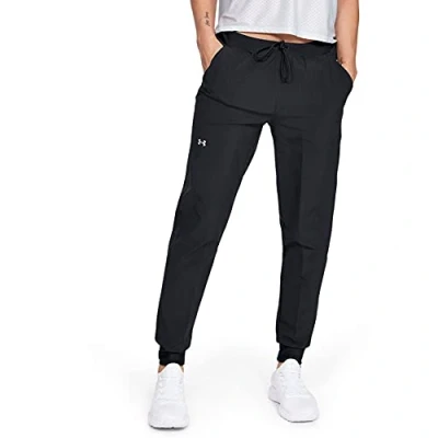 Image of Under Armour women&#039;s UA Sport Woven Pant, comfortable tracksuit bottoms, jogger bottoms with tapered leg