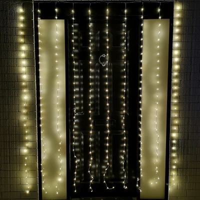 Image of 2.1m 300 LED Indoor Outdoor Party Curtain Christmas Lights in Warm White