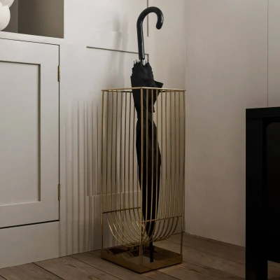 Image of AYTM umbrella stand Curva, gold coloured, height 56 cm, steel