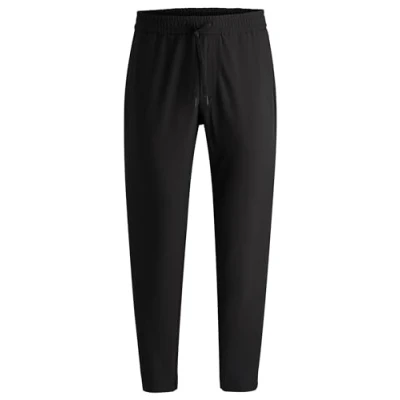 Image of BOSS FLEX Tracksuit bottoms, Men&#039;s, Size: 38L, Black